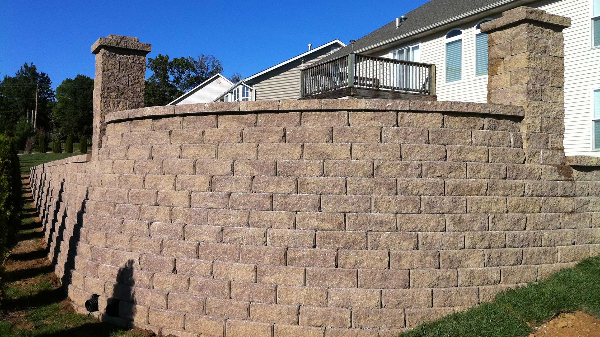 Custom retaining wall designed for a home in Columbia, IL.
