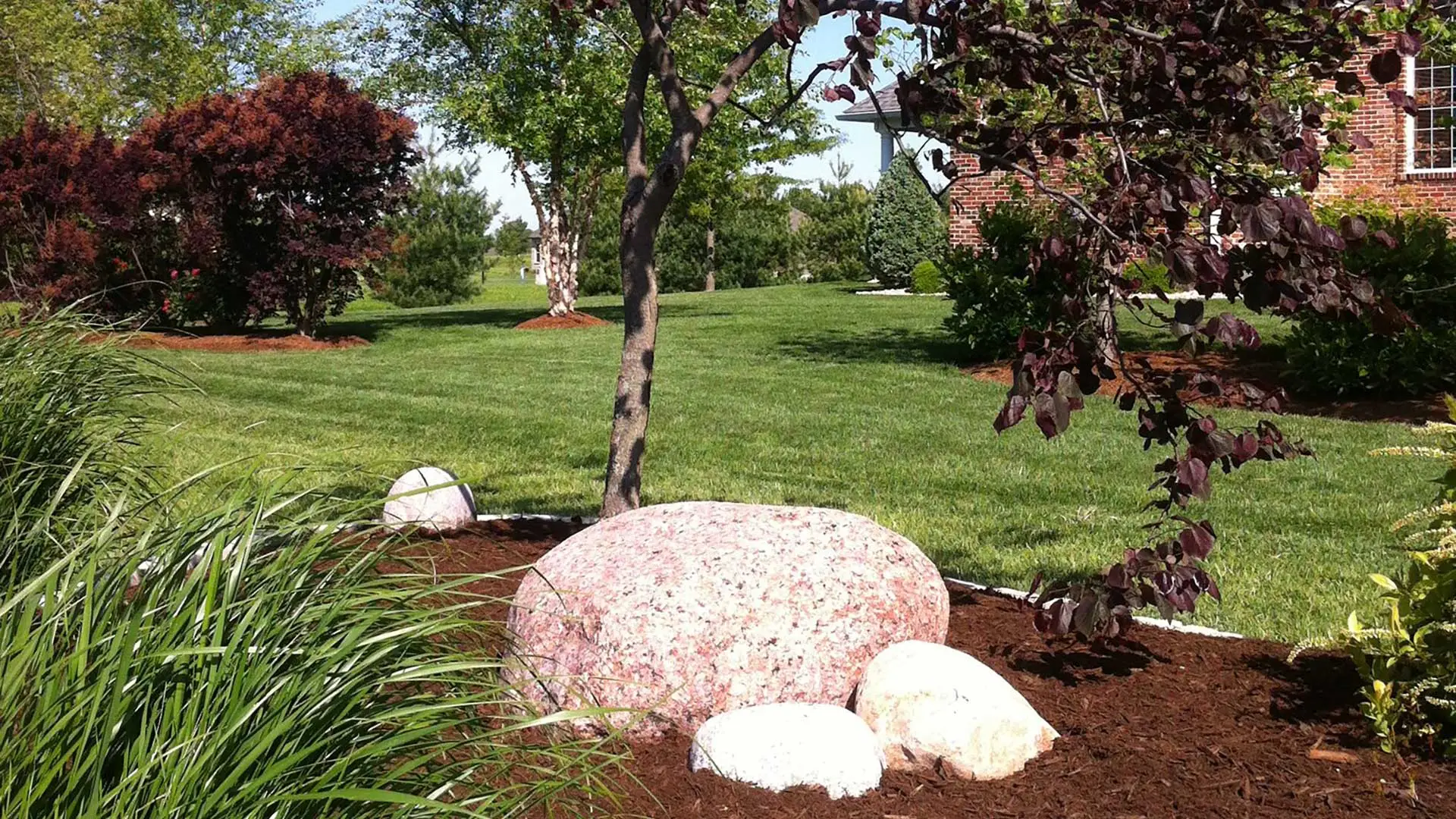 A custom landscape installation for a home in Waterloo, IL.