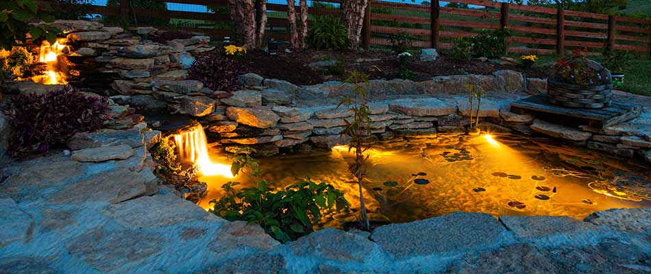 Outdoor lighting around a water feature in Columbia, Illinois.