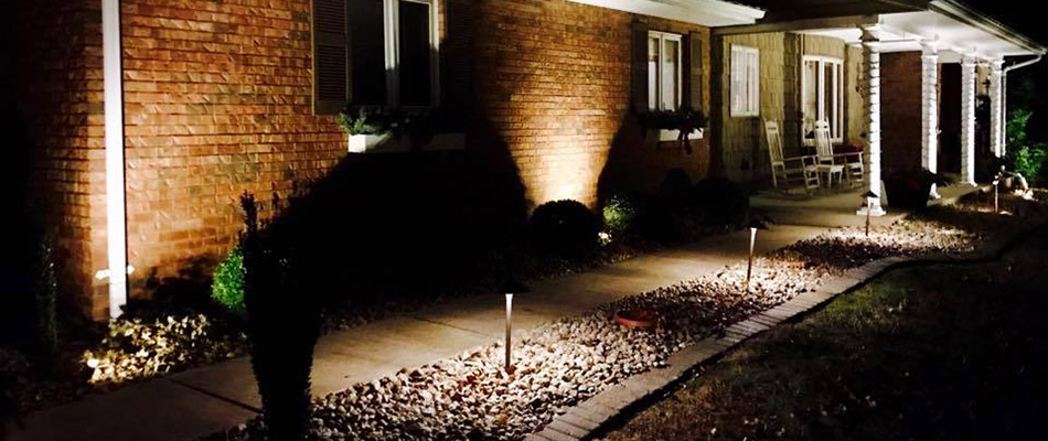 Outdoor lighting installed in front of a home in Columbia, IL.