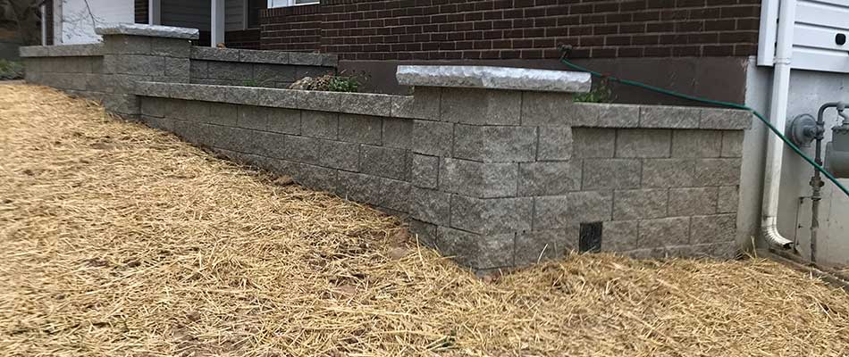 Custom stone retaining wall construction in Columbia, IL.