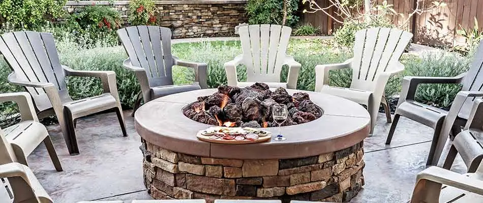 This custom patio and fire pit in Columbia, IL provides a great outdoor space for the homeowner.
