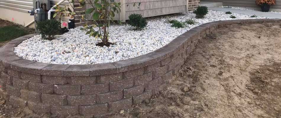 Retaining walls can also serve as raised planter beds such as this one in Millstadt, IL.
