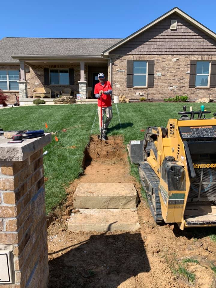 Fixing the slope of the lawn in Waterloo, Illinois